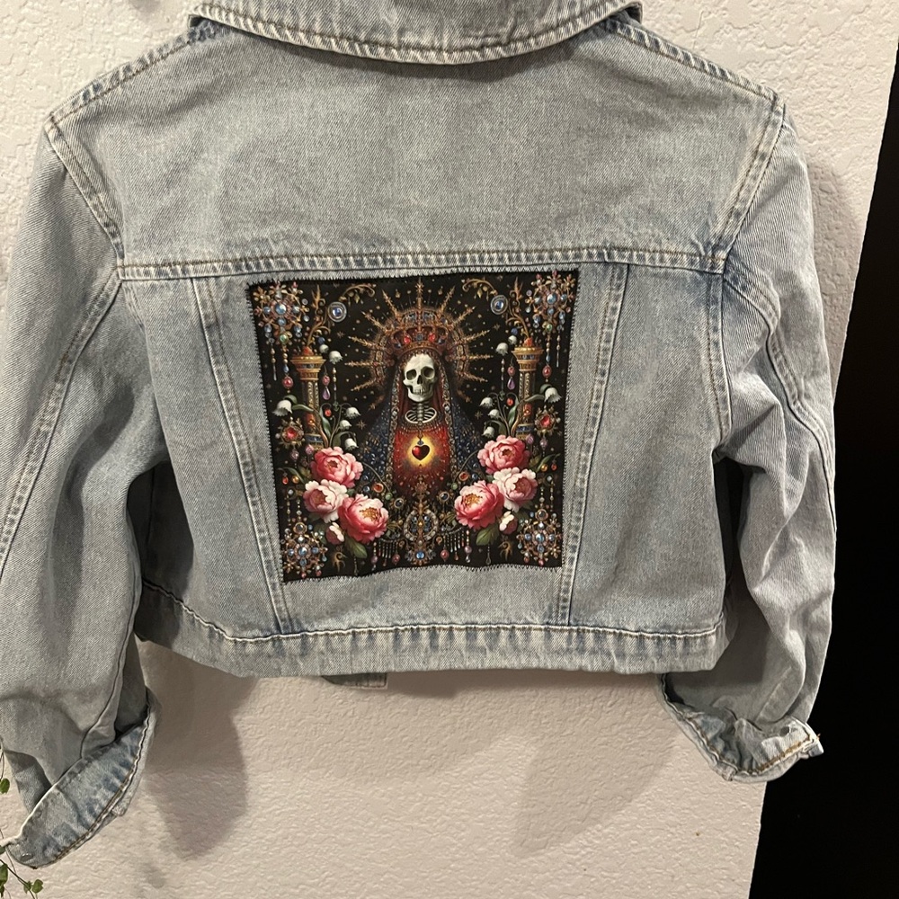 Beautiful dia de Los Muertos appliqué on back of Light Blue Jean Jacket